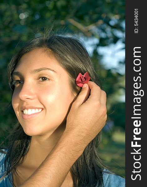 Red Flower in her Hair - Close up - Vertical