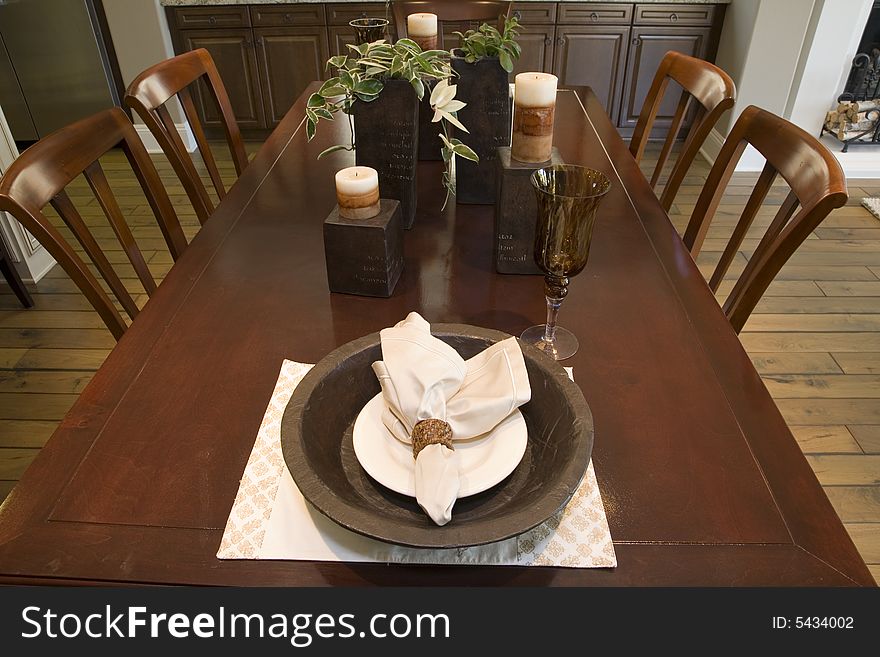 Dining table with modern tableware and decor. Dining table with modern tableware and decor.