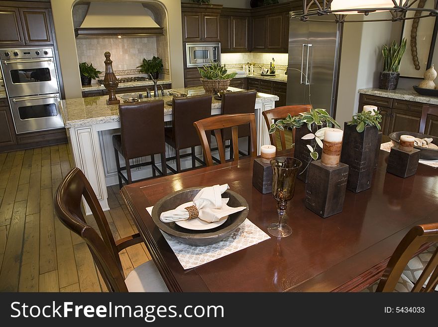 Luxury home dining room and kitchen.