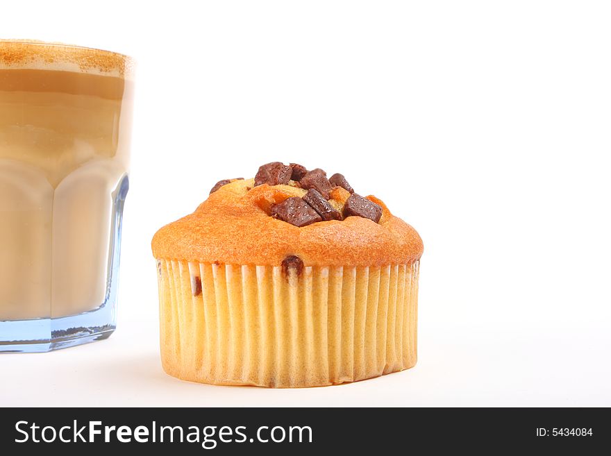 A  cup of coffee with muffin isolated on white. A  cup of coffee with muffin isolated on white