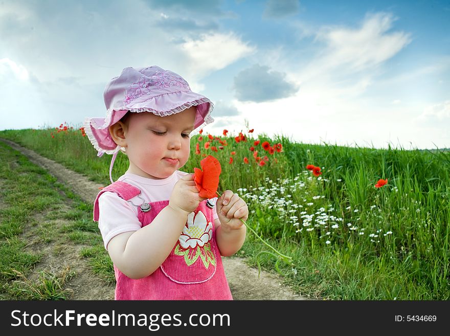 Girl with red poppy