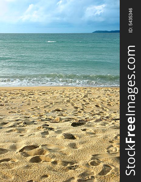 Peaceful sandy tropical beach on a summer day. Peaceful sandy tropical beach on a summer day