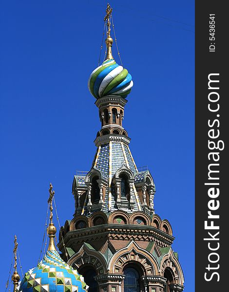 Domes of orthodox church on a blue sky background. St.Petersburg, Russia