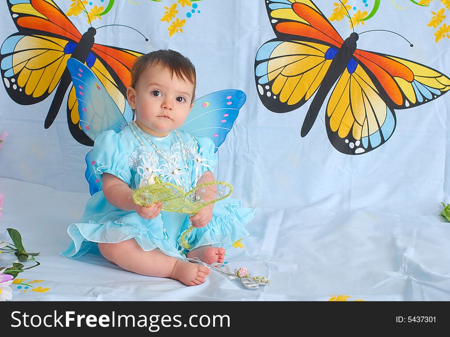 Baby girl with butterfly wings