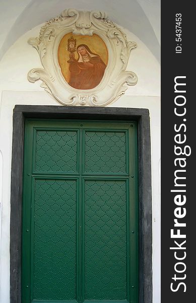 Old green doors , Italy