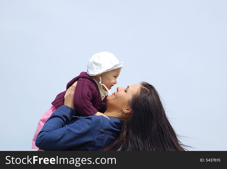 Happy family on sky background. Happy family on sky background