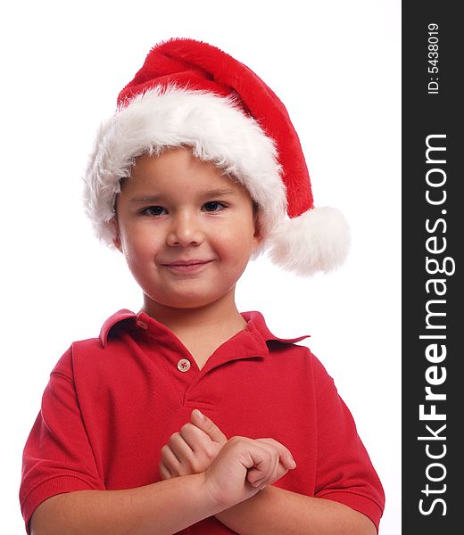 Cute ethnic boy with a santa hat. Cute ethnic boy with a santa hat