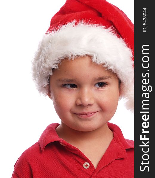 Cute ethnic boy with a santa hat. Cute ethnic boy with a santa hat