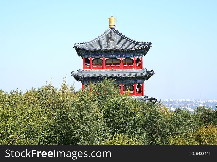 Pagoda tower in trees in china town