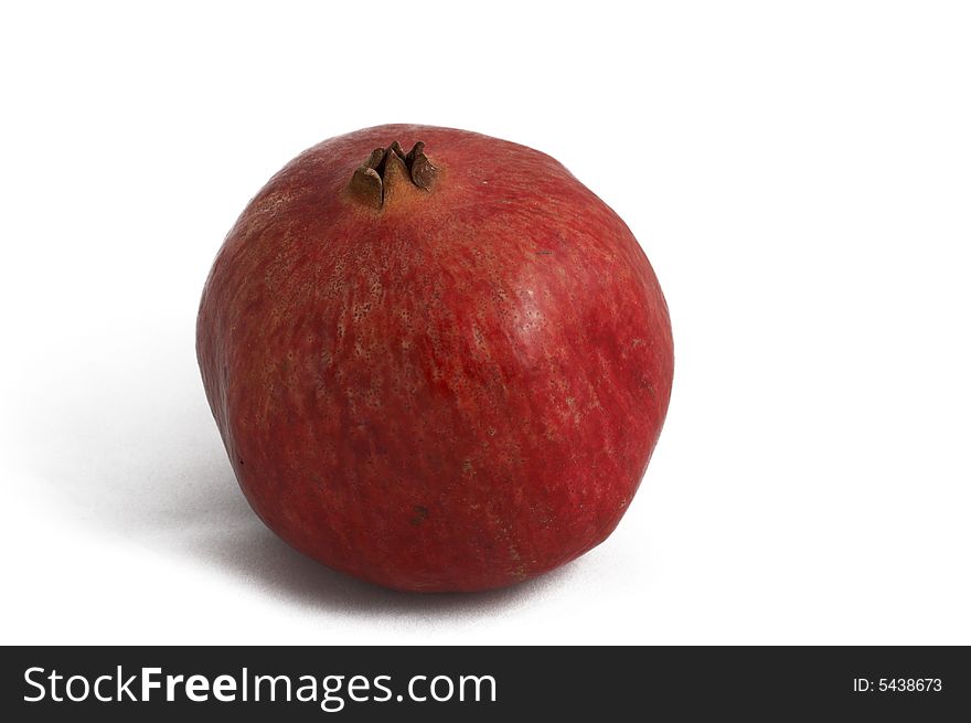 Red pomegranate on white background