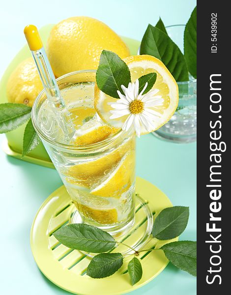 Closeup of glass of iced cold soda with lemon. Closeup of glass of iced cold soda with lemon