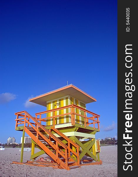 Green and Yellow Lifeguard Tower in South Beach