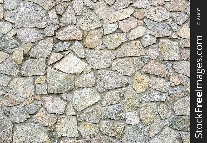 A rough wall made of big stones. A rough wall made of big stones