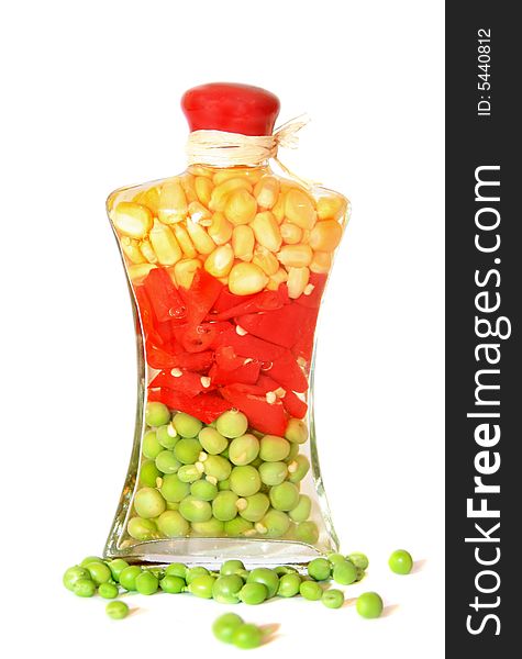 Set-corn, pepper and peas in glass bank on a white background