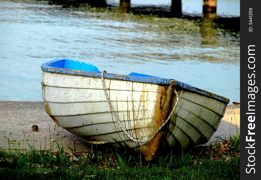 An original shot of a boat resting on a bank. An original shot of a boat resting on a bank