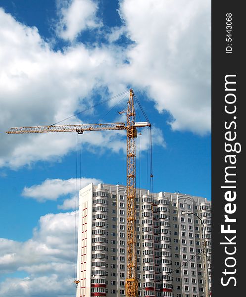 New residential building on sky background