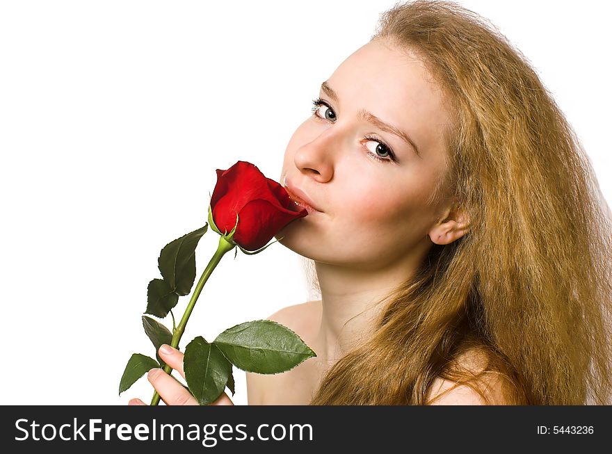 The beautiful blonde with a rose close up. The beautiful blonde with a rose close up