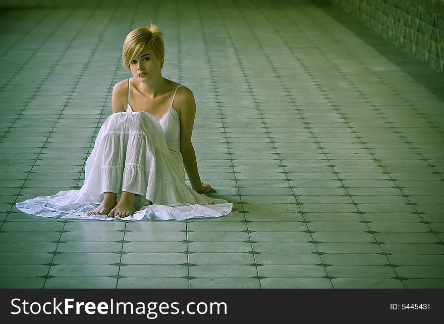 Young blonde on the floor