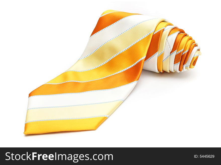 A rolled up necktie isolated on white background.