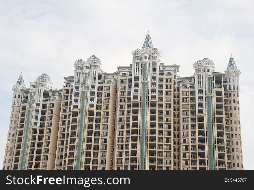 The luxury apartment building with spires like a castle or church, high observation Elevator,Foshan,Guangdong,China. The luxury apartment building with spires like a castle or church, high observation Elevator,Foshan,Guangdong,China.