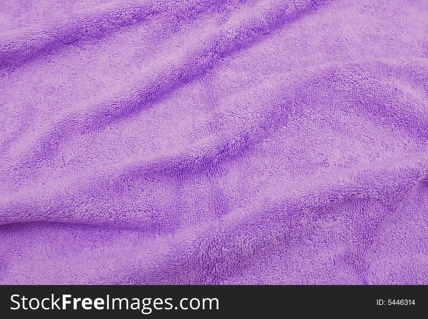 Cotton cloth textured background in purple color.