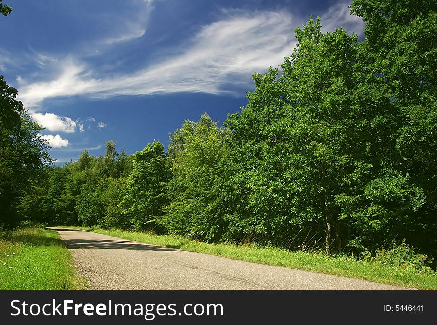 Road with blue sky above