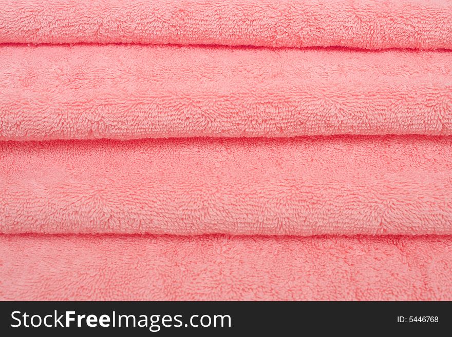 Pink cotton cloths stacked in many layers. Pink cotton cloths stacked in many layers.