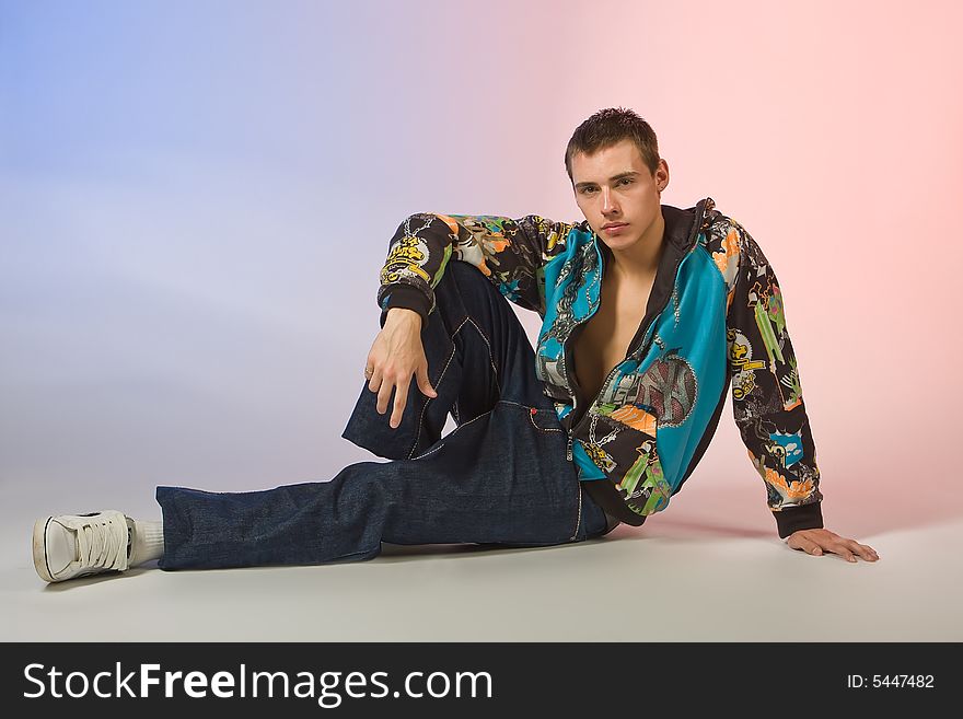 The Young Man Posing In Studio