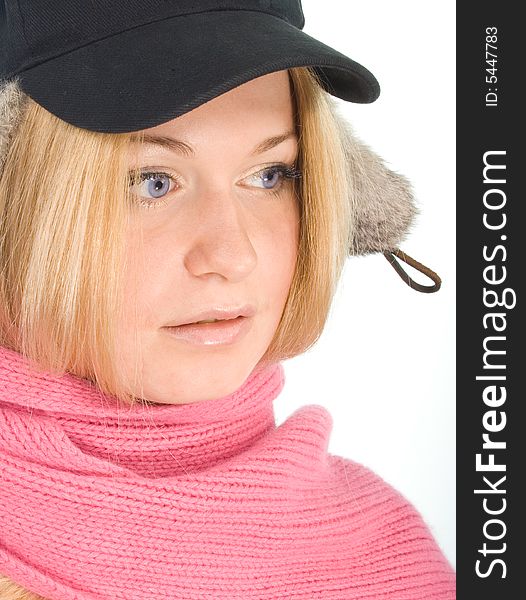 Pretty blue-eyed blonde in fur cap and pink scarf. Pretty blue-eyed blonde in fur cap and pink scarf