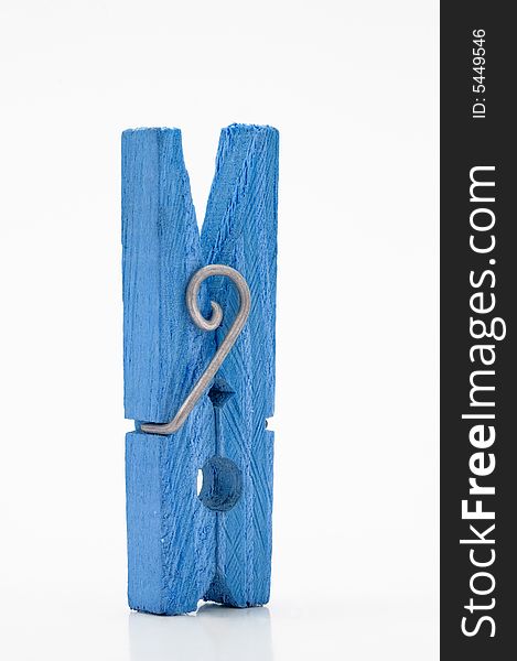 Blue Clothespin On A White Background