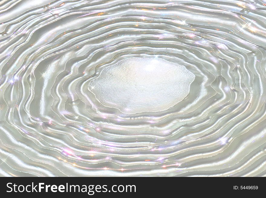 Pearled water ripples in sparkling water/ Silver