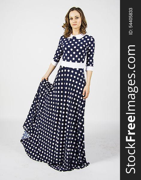 Model In Polka Dot Dress Of Blue Color