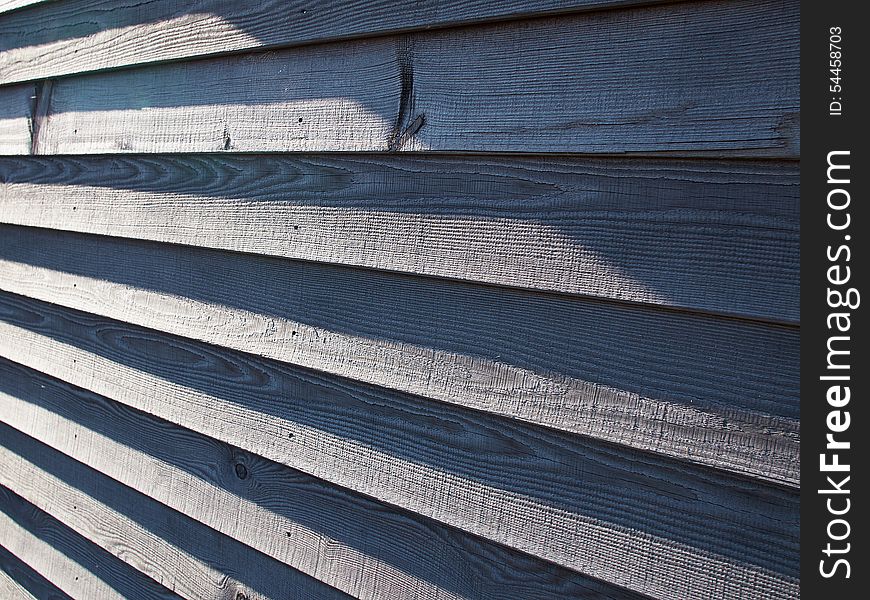 Wood wall siding in closeup view perspective angle