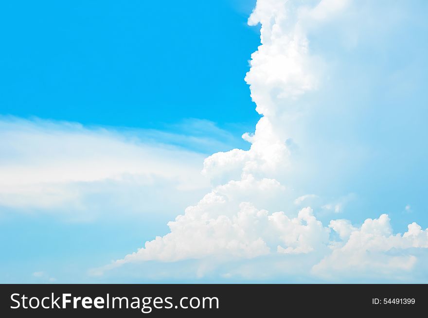Bright summer blue sky and clouds as background