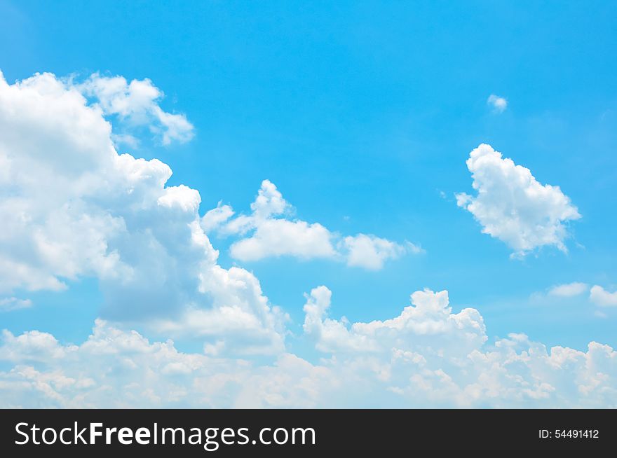 Bright summer blue sky and clouds as background