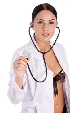 Pretty Female Doctor Holding Stethoscope Stock Image