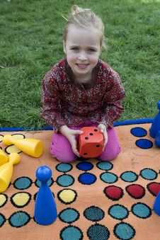 Child Playing With A Board Royalty Free Stock Images Child Playing With A Board Royalty Free Stock Images
