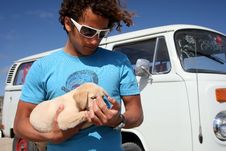 Surfer Guy And His Dog Royalty Free Stock Photo
