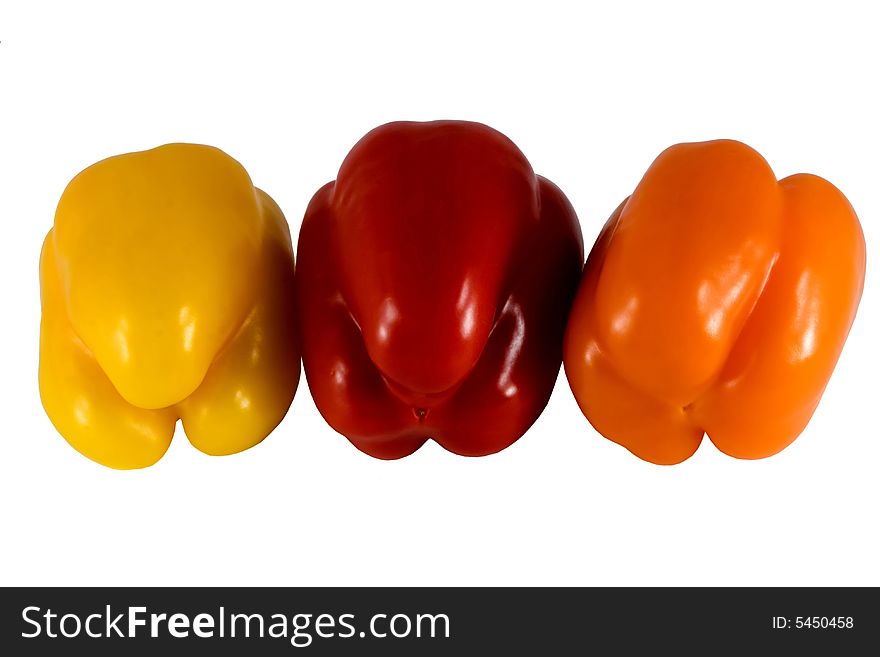 Sweet Bulgarian  peppers of three colors - yellow red and orange. Sweet Bulgarian  peppers of three colors - yellow red and orange