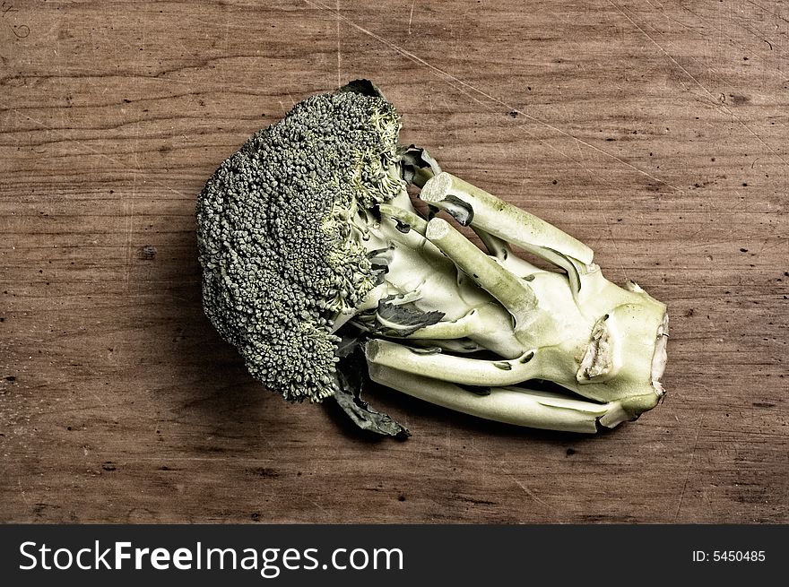 Broccoli on wooden table, studio.