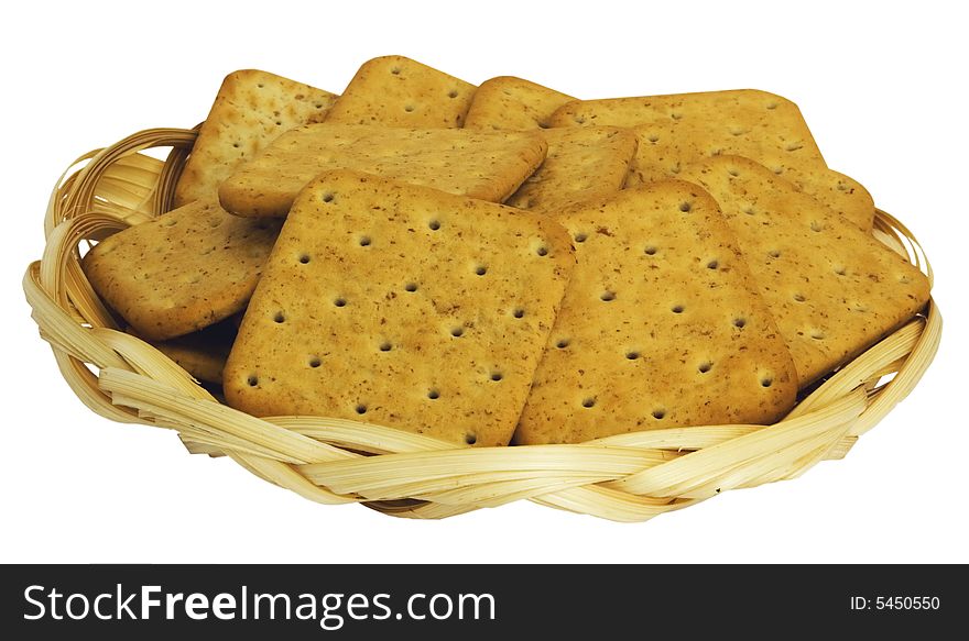 Crackers with rye brans in a small basket from the wooden shaving