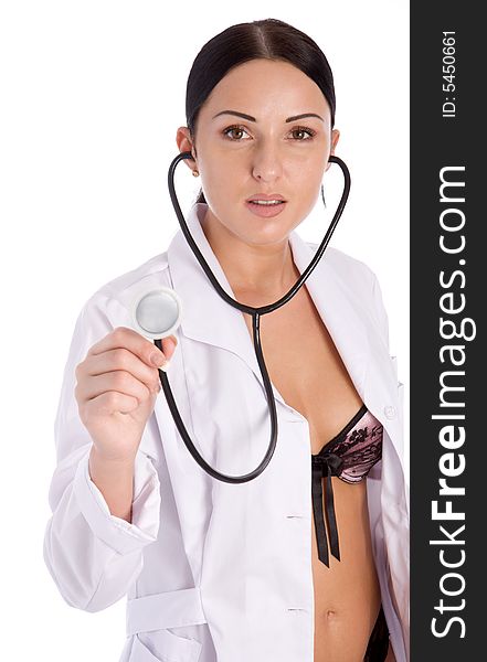 Pretty female doctor holding stethoscope isolated on white background