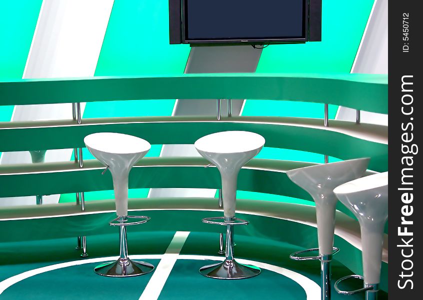 Furniture for a bar in green tones from a plastic and nickel