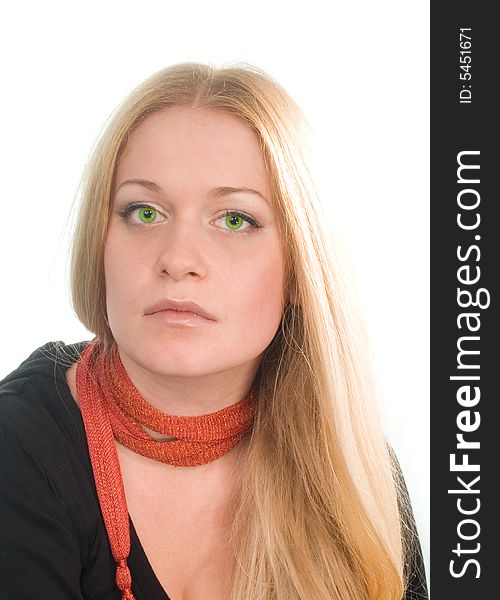 Portrait of sad green-eyed blonde in black on white background