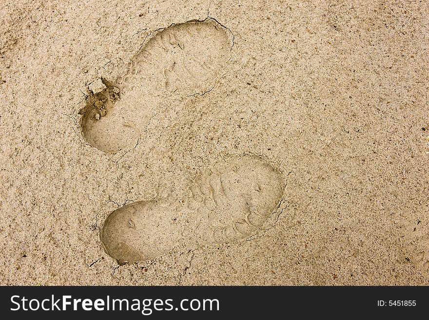 Footprints going over a sand