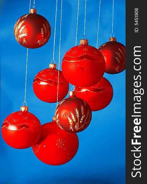 Colorful christmas balls against blue background