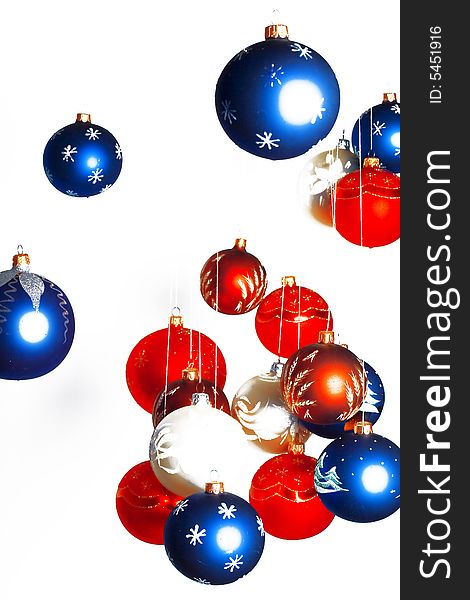 Colorful christmas balls against the white background