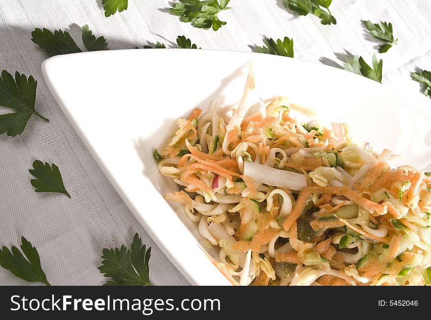 Fresh spring salad with carrot and cabbage