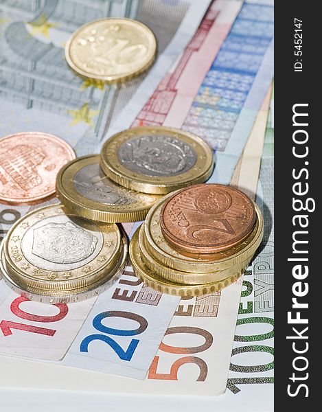 Close up euro banknotes and coins. Close up euro banknotes and coins
