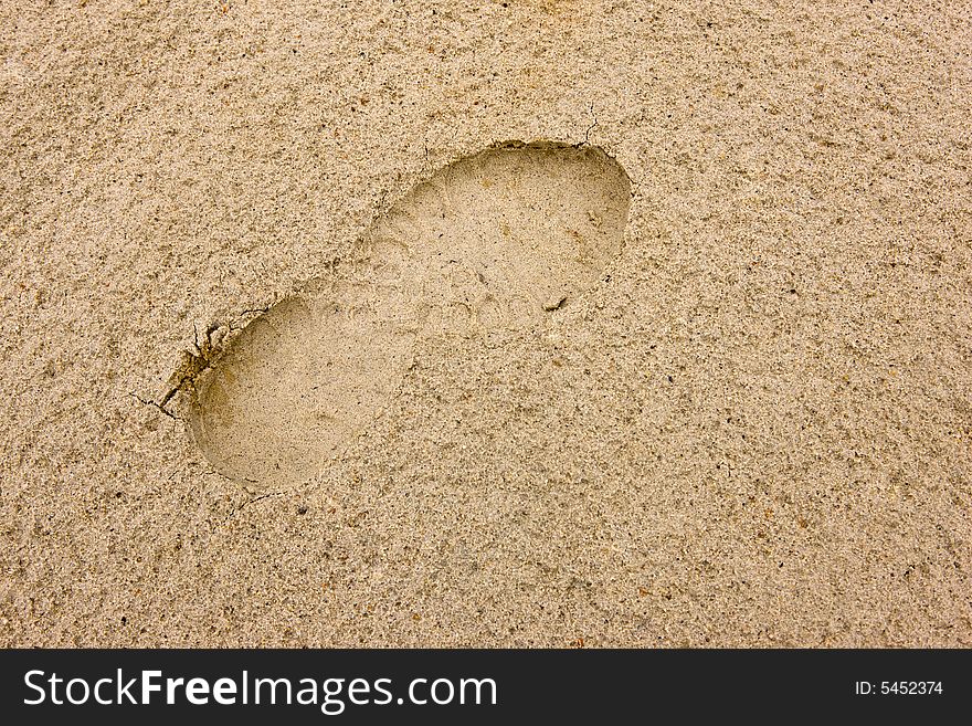 Footprints going over a sand